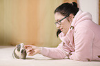 young woman with guinea pig