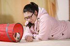 young woman with guinea pig