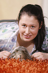 young woman with guinea pig