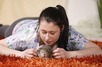 young woman with guinea pig