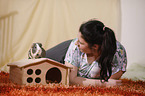 young woman with guinea pig