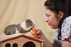 young woman with guinea pig