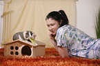 young woman with guinea pig